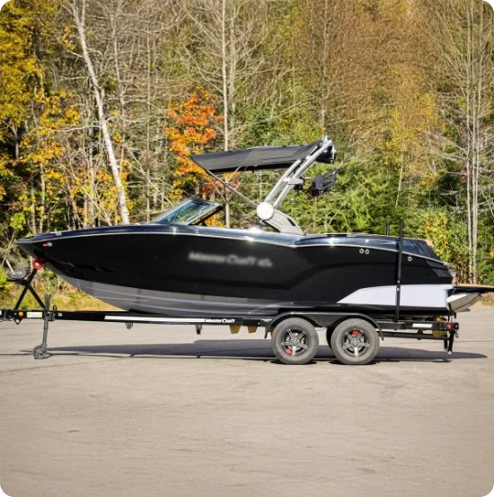black boat hull viewed from side on water