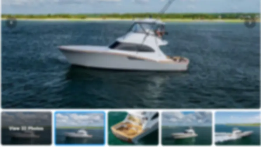 A boat listing page, blurred